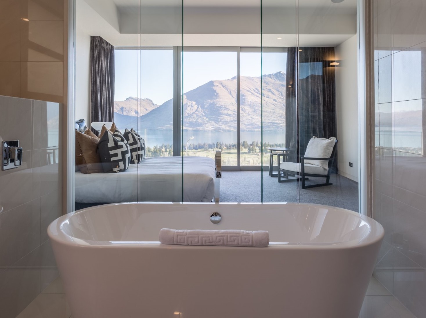 Bathroom with a view of Lake Wakatipu. Property Name, Views on Edinburgh presented by Relax it's Done Luxury Property Management.